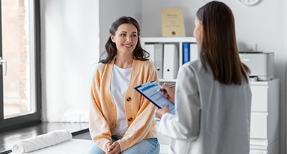 Doctor talking to patient  