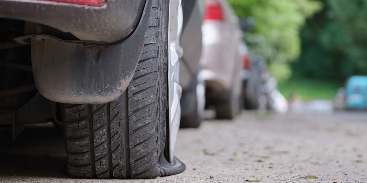 Deflated car wheel breakdown 