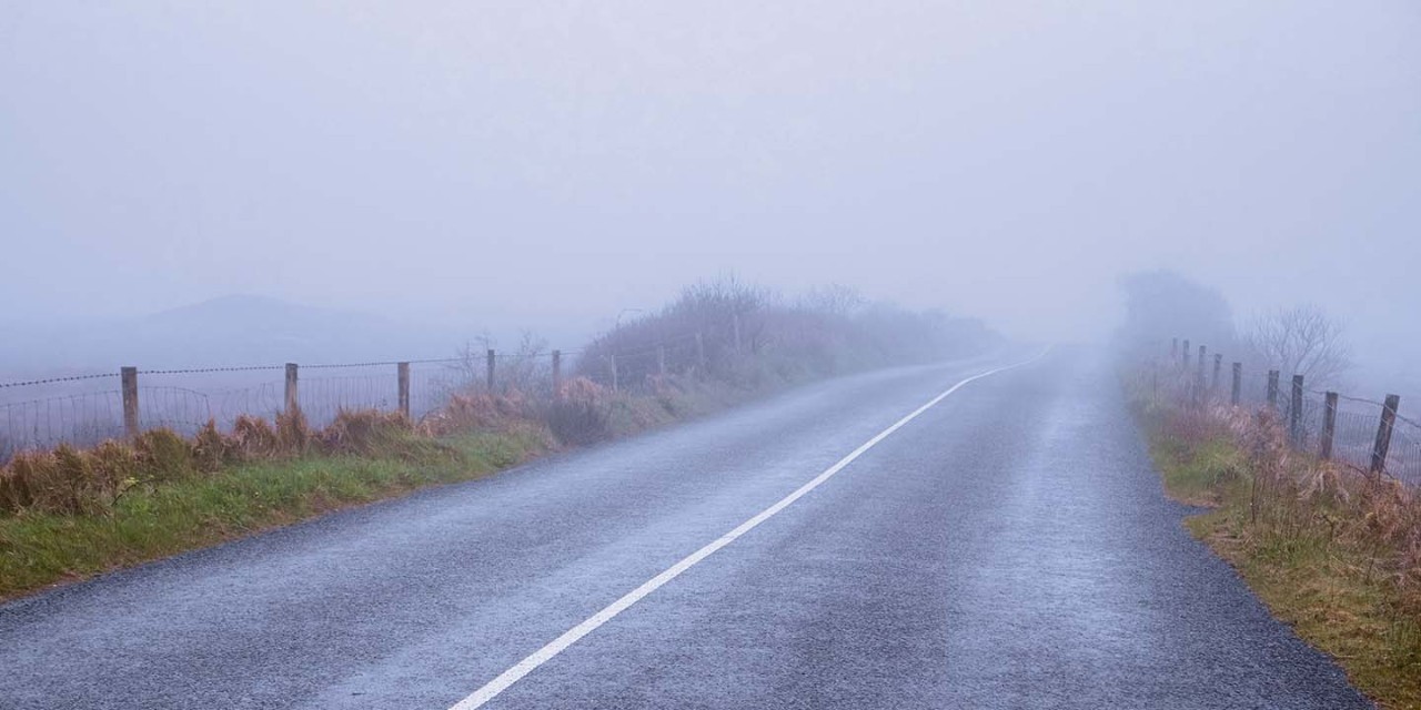 Heavy fog road