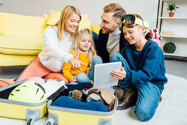 family packing for a ski trip