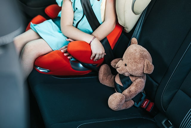 You may not operate a vehicle unless all child passengers are either wearing a safety cheap