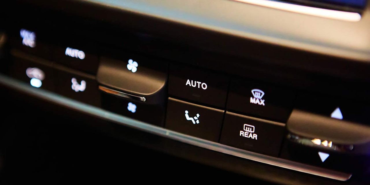 Selector button switch of the air conditioner system on car dashboard