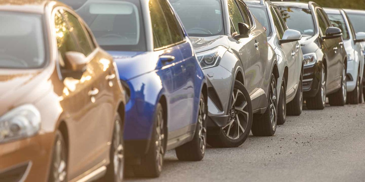 long rows of cars parking on the street