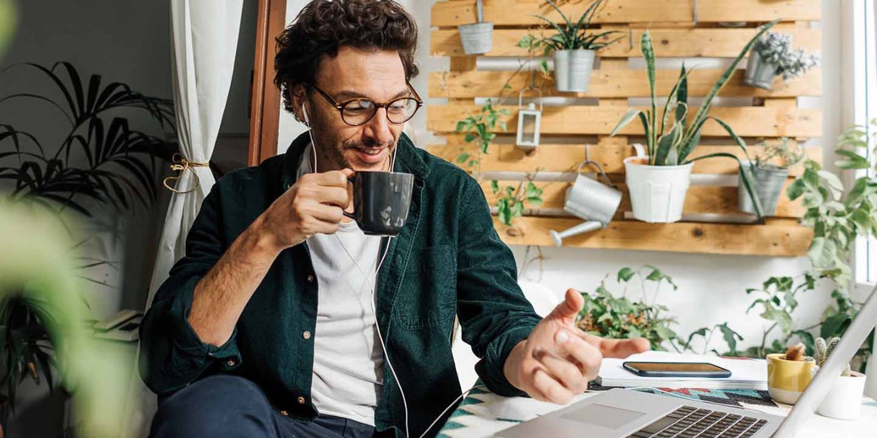  man talking on the meeting through laptop