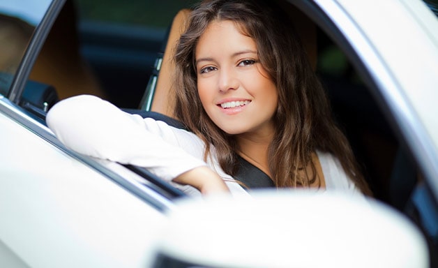car young woman smiling