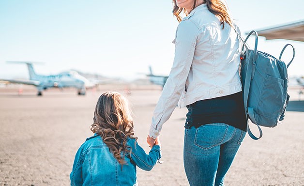 mom and daughter at the airport